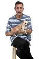 Photo of the sitting old man with dog