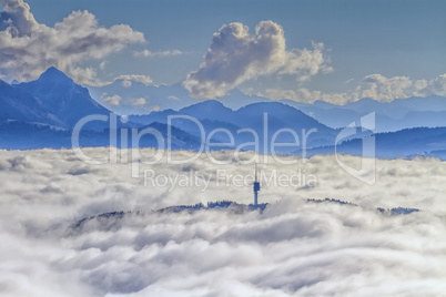 Mont-Gibloux and Alps mountains upon clouds, Fribourg, Switzerland