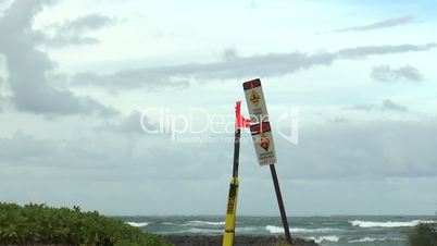 warning sign strong current at hawaii beach on big island