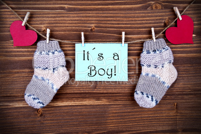 Label with It's a Boy and Baby Stockings on a Line