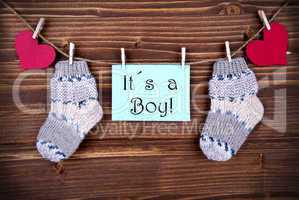 Label with It's a Boy and Baby Stockings on a Line