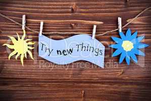 Light Blue Lable Saying Try New Things
