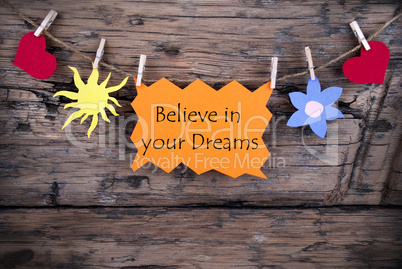 Orange Lable Saying Believe In Your Dreams
