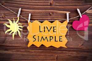 Orange Lable Saying Live Simple