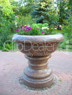 beautiful flowers on the flower-bed from marble