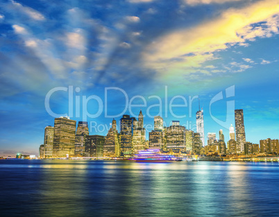 Amazing Manhattan skyline from Brooklyn after sunset with river