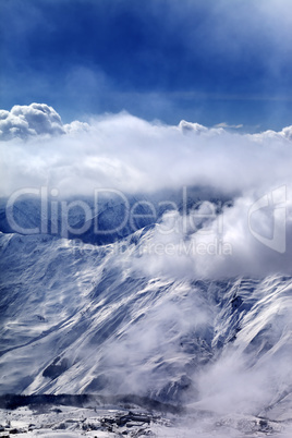 Evening view on ski resort in mist