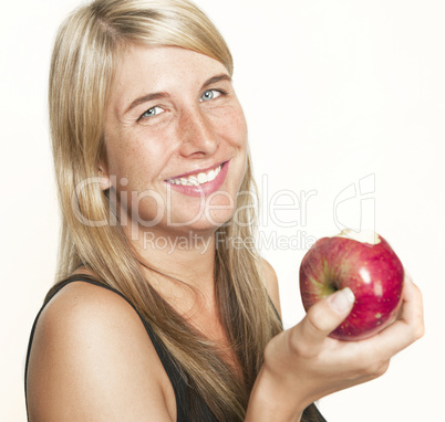 laughing woman with apple