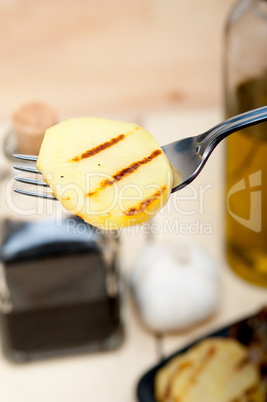 grilled potato on a fork