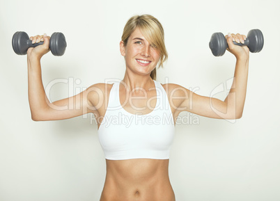 Woman with dumbbells