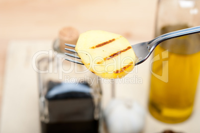 grilled potato on a fork