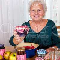 Granny proudly displays her homemade jam