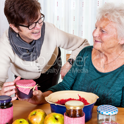 Two women talk about the homemade jam