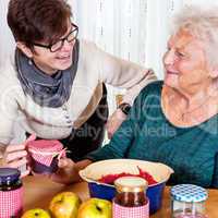 Two women talk about the homemade jam