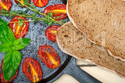 baked cherry tomatoes with basil and thyme