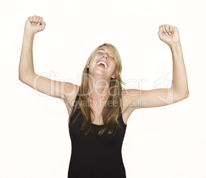 Woman cheering with arms in the air