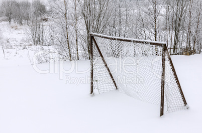 Soccer goal covered with snow