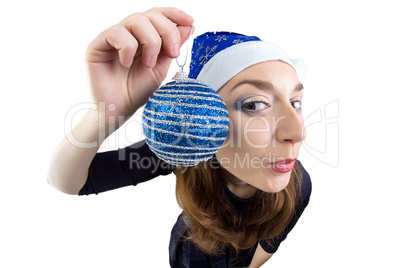Young woman holding the christmas ball