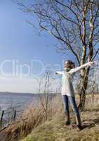 Woman enjoying sun in winter