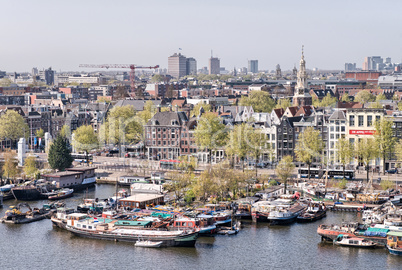 Amsterdam. Wonderful view of city canals and buildings in spring