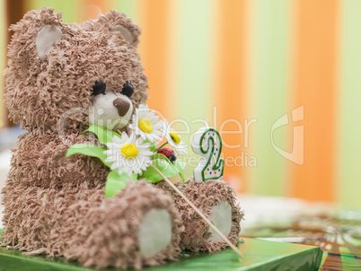 Birthday cake in the shape of toy bears