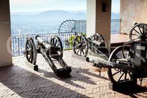 Old cannon on gun carriage aims to Graz