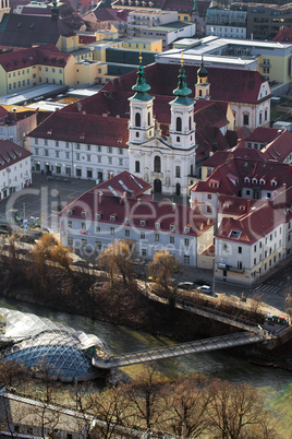 The Mariahilfer church and Island on Mur river connected by a mo