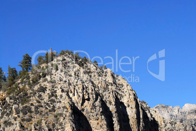 Cliff against blue sky