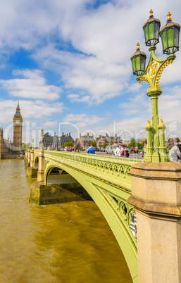 LONDON - SEPTEMBER 29, 2013: Tourists walk on Westminster Bridge