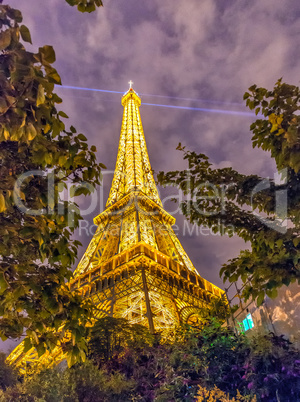 PARIS - JUNE 12, 2014: Lights of Eiffel Tower after sunset. La T