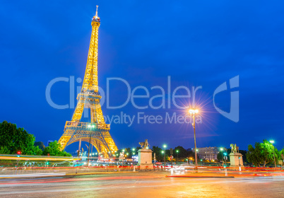 PARIS - JUNE 12, 2014: Lights of Eiffel Tower after sunset. La T