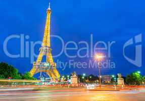 PARIS - JUNE 12, 2014: Lights of Eiffel Tower after sunset. La T