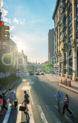 NEW YORK CITY - JUNE 15, 2013: Tourists walk along city streets