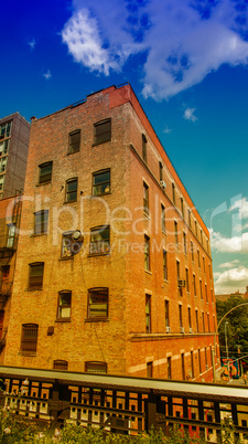 Highline Park in Manhattan with city skyline on a beautiful day