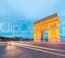 Amazing sunset view of Triumph Arc in Paris with Etoile Roundabo