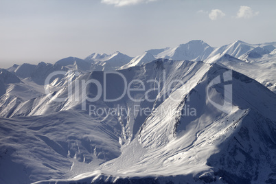 Mountain with icy slope in evening