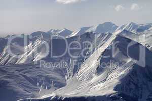 Mountain with icy slope in evening