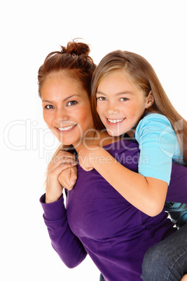 Mother piggyback her daughter.