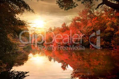 Autumn sunset over river