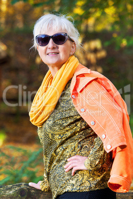 Middle-aged woman in autumnal nature