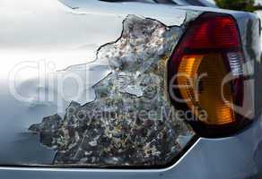 Damaged car, side view