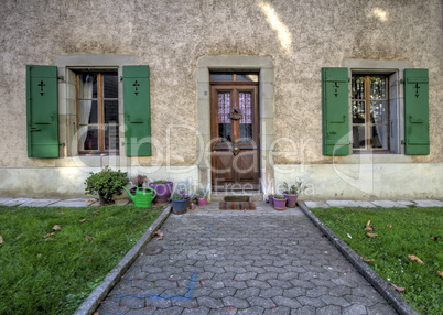 Entrance of a house as seen from the street, Carouge city, Switzerland