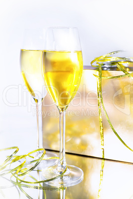 Two glasses of wine and a box on white background