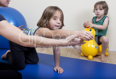 Physiotherapy with two children