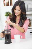 Asian Chinese Woman Girl in Kitchen Making Coffee