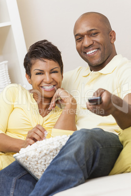 Happy African American Woman Couple Remote Control