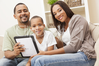 African American Family Using Tablet Computer