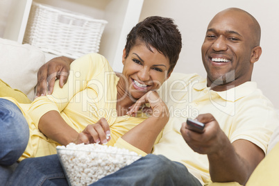 Happy African American Woman Couple Remote Control