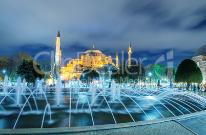 Sultanahmet fountain at night with Blue Mosque on background