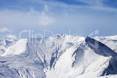 Snowy mountains with avalanches